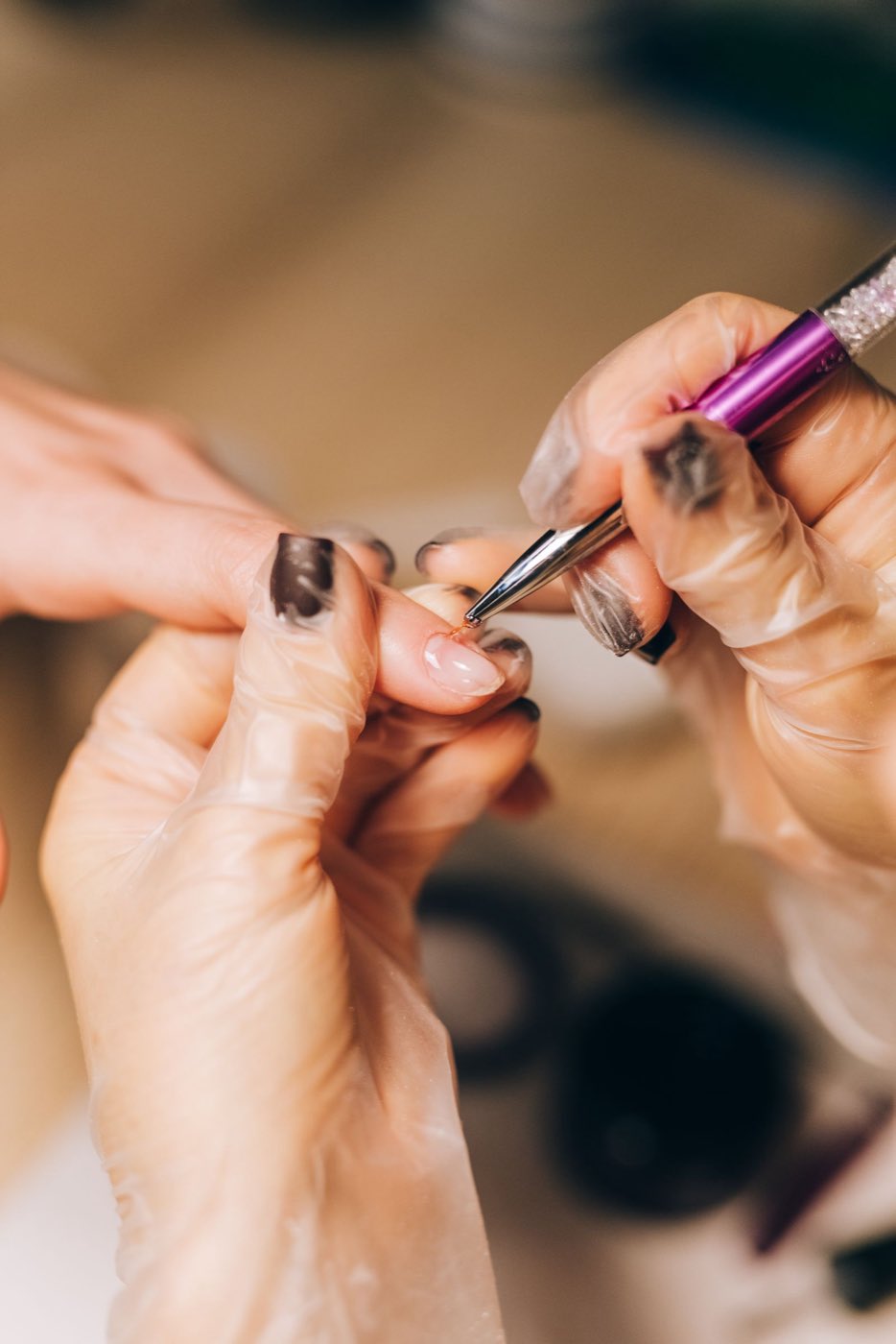 A manicure in progress, polish detail